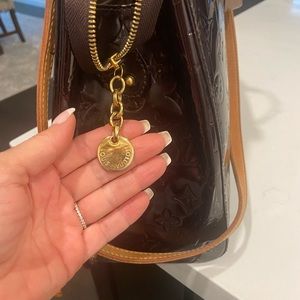 Louis Vuitton Brea- GM. Vernis leather. Amarante color. Authentic.